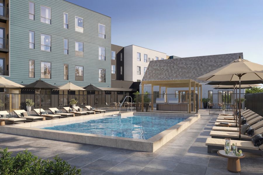 Large Outdoor Swimming Pool with Sundeck at The Dorian in Lake Elmo, MN